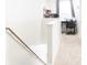 Upstairs hallway with workspace and staircase at 9016 Pyrus St, Kissimmee, FL 34747