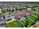 Beautiful aerial view of the neighborhood highlighting the well-maintained lawns and screened-in patios at 9056 Pinch Shot Dr, Winter Garden, FL 34787