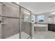 Bathroom with a walk-in shower, soaking tub, and stylish fixtures at 9056 Pinch Shot Dr, Winter Garden, FL 34787