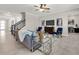 Bright and airy living room features neutral walls, modern furnishings, and tiled floors, offering a cozy atmosphere at 9056 Pinch Shot Dr, Winter Garden, FL 34787