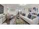 Elegant living room with hardwood floors, comfortable seating, and modern decor at 9056 Pinch Shot Dr, Winter Garden, FL 34787