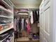 Spacious closet with custom shelving and hanging racks offering ample storage solutions at 9435 Myrtle Creek Ln # 304, Orlando, FL 32832