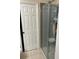 Modern bathroom featuring a glass-enclosed shower with sleek fixtures and neutral tones at 1019 Lake Berkley Dr, Kissimmee, FL 34746