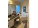 Clean bathroom featuring a soaking tub, vanity and built in make-up table at 1019 Lake Berkley Dr, Kissimmee, FL 34746