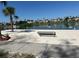 Lakeside community spot to sit and relax on the sand while watching the pond at 1019 Lake Berkley Dr, Kissimmee, FL 34746