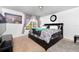 Comfortable bedroom with carpet, modern furnishings, and natural light from the window at 1190 Sandestin Way, Orlando, FL 32824