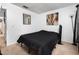 Bedroom with minimalistic decor, a comfortable bed, and a neutral color palette at 1190 Sandestin Way, Orlando, FL 32824