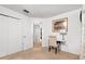 Well-lit bedroom offering a versatile space for relaxation or study with a desk and chair at 1190 Sandestin Way, Orlando, FL 32824