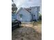 Backyard with patio and exterior access to the home at 130 Avenue H Se, Winter Haven, FL 33880