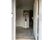 Home entryway with rug, painting and access to the rest of the home at 130 Avenue H Se, Winter Haven, FL 33880