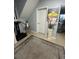 Home entryway with rug, painting and access to the stairs at 130 Avenue H Se, Winter Haven, FL 33880