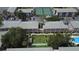 Aerial view features manicured green spaces and inviting recreational areas within a residential community at 131 Water Front Way # 220, Altamonte Springs, FL 32701