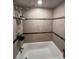 Bathroom featuring a shower with tile surround and modern fixtures at 131 Water Front Way # 220, Altamonte Springs, FL 32701
