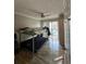 Bedroom with bunk beds, hardwood floors, and a sliding glass door leading to a balcony at 131 Water Front Way # 220, Altamonte Springs, FL 32701