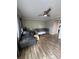 Comfortable living room featuring hardwood floors, a ceiling fan, and neutral-colored furniture at 131 Water Front Way # 220, Altamonte Springs, FL 32701