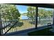Serene balcony with views of the lake, providing a peaceful outdoor living space at 14963 Braywood Trl, Orlando, FL 32824