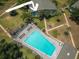 Community pool with lots of chairs for residents of the complex at 1695 Lee Rd # E215, Winter Park, FL 32789