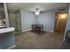 Cozy dining area with a ceiling fan and a table set for four, perfect for enjoying casual meals at 1695 Lee Rd # E215, Winter Park, FL 32789
