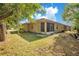 Expansive backyard with a screened patio, offering a serene outdoor living space at 1773 Barton Towne Cir, St Cloud, FL 34769
