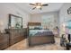 Cozy bedroom with stylish decor, a large dresser, and a serene atmosphere at 1773 Barton Towne Cir, St Cloud, FL 34769