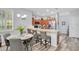 Updated kitchen and breakfast bar featuring stainless steel appliances and hardwood cabinets at 1773 Barton Towne Cir, St Cloud, FL 34769