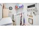 Functional laundry room with modern appliances, storage, and charming decorative touches at 1773 Barton Towne Cir, St Cloud, FL 34769