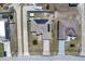 An aerial view reveals a single-Gathering home complete with a two-car driveway and solar panels at 199 Maple Dr, Kissimmee, FL 34759