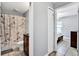 Clean bathroom with a toilet, sink, and a Paris-themed shower curtain at 199 Maple Dr, Kissimmee, FL 34759