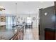 Bright, open kitchen with a large island and stainless steel appliances at 199 Maple Dr, Kissimmee, FL 34759