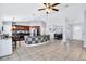Spacious kitchen with dark wood cabinets, large island with tile and a dining space at 199 Maple Dr, Kissimmee, FL 34759