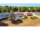 Aerial view of backyard with pool in residential neighborhood at 1930 Knollcrest Dr, Clermont, FL 34711