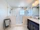 Contemporary bathroom offers a frameless glass shower and a sleek, modern vanity at 1930 Knollcrest Dr, Clermont, FL 34711