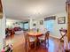 Warm dining room seamlessly connects to the living room, creating an open and inviting entertaining space at 1930 Knollcrest Dr, Clermont, FL 34711
