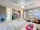 Large living area with neutral carpet and a comfortable seating area at 1930 Knollcrest Dr, Clermont, FL 34711