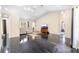 Expansive living area showcasing high ceilings, stylish flooring, and seamless transition to the rest of the home at 2074 King Richards Ct, Orange City, FL 32763