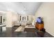 Bright living room featuring neutral-colored walls, tile floors, and a comfortable sectional sofa at 2074 King Richards Ct, Orange City, FL 32763