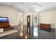 Open-concept living room boasting high ceilings, modern flooring, and seamless flow to other spaces at 2074 King Richards Ct, Orange City, FL 32763