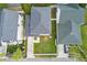 Aerial view of the home showcasing the well-maintained lawn and roof at 212 Ficus St, Celebration, FL 34747