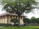 Community center with manicured landscaping and classic design elements at 212 Ficus St, Celebration, FL 34747