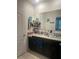 Bathroom with dual vanity sinks and ample countertop space at 219 Duke Dr, Deland, FL 32724