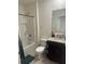 Standard bathroom features a shower-tub combo and a vanity with granite countertops at 219 Duke Dr, Deland, FL 32724
