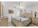 Bedroom with ceiling fan, closet space, tiled flooring, and neutral decor at 2289 Jessica Ln, Kissimmee, FL 34744