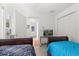 Bedroom featuring twin beds, a tiled floor, and closet for ample storage space at 2289 Jessica Ln, Kissimmee, FL 34744