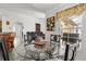 Cozy breakfast nook featuring a glass table set with a window view to the pool at 2289 Jessica Ln, Kissimmee, FL 34744