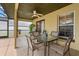 Relaxing screened in patio featuring neutral decor and furniture at 2289 Jessica Ln, Kissimmee, FL 34744