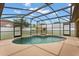 Pool and patio area enclosed by a screen at 2289 Jessica Ln, Kissimmee, FL 34744