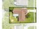 Aerial view of a home with a fenced yard and surrounding landscaping at 2430 Mill Run Blvd, Kissimmee, FL 34744