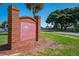 Welcome to Mill Run, a neighborhood of families, with a brick sign and manicured lawn at 2430 Mill Run Blvd, Kissimmee, FL 34744