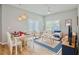 Open-concept living and dining area with stylish furnishings and natural light at 2611 Gala N Rd # 101, Kissimmee, FL 34746