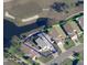 Aerial view of the property showing the home, surrounding landscaping, and neighborhood at 2615 Autumn Green Dr, Orlando, FL 32822